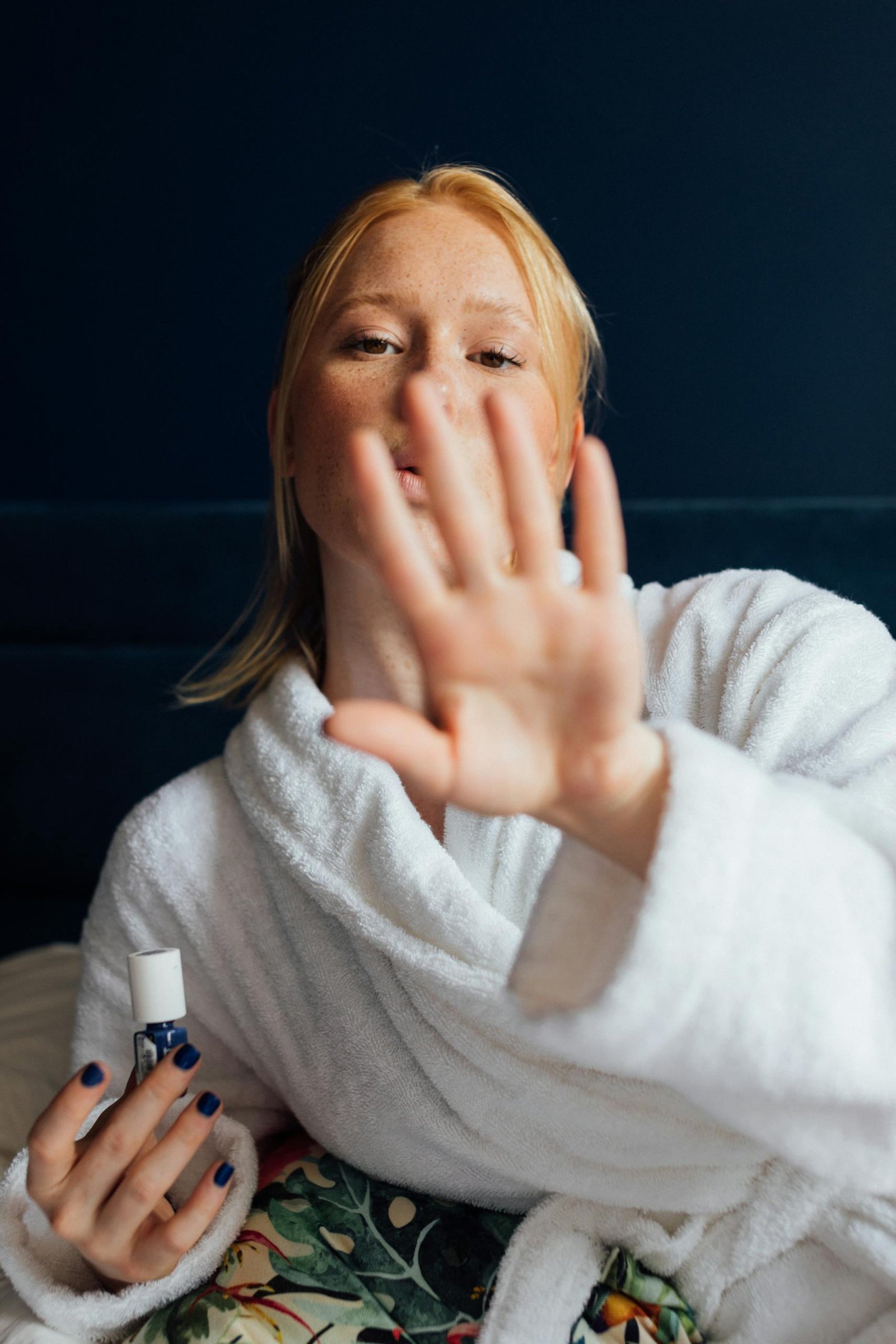 A Woman Checking Her Nails